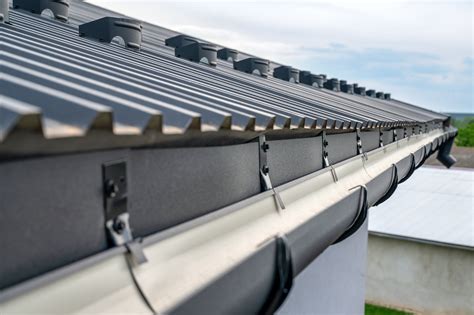 wide gutters for metal roof.